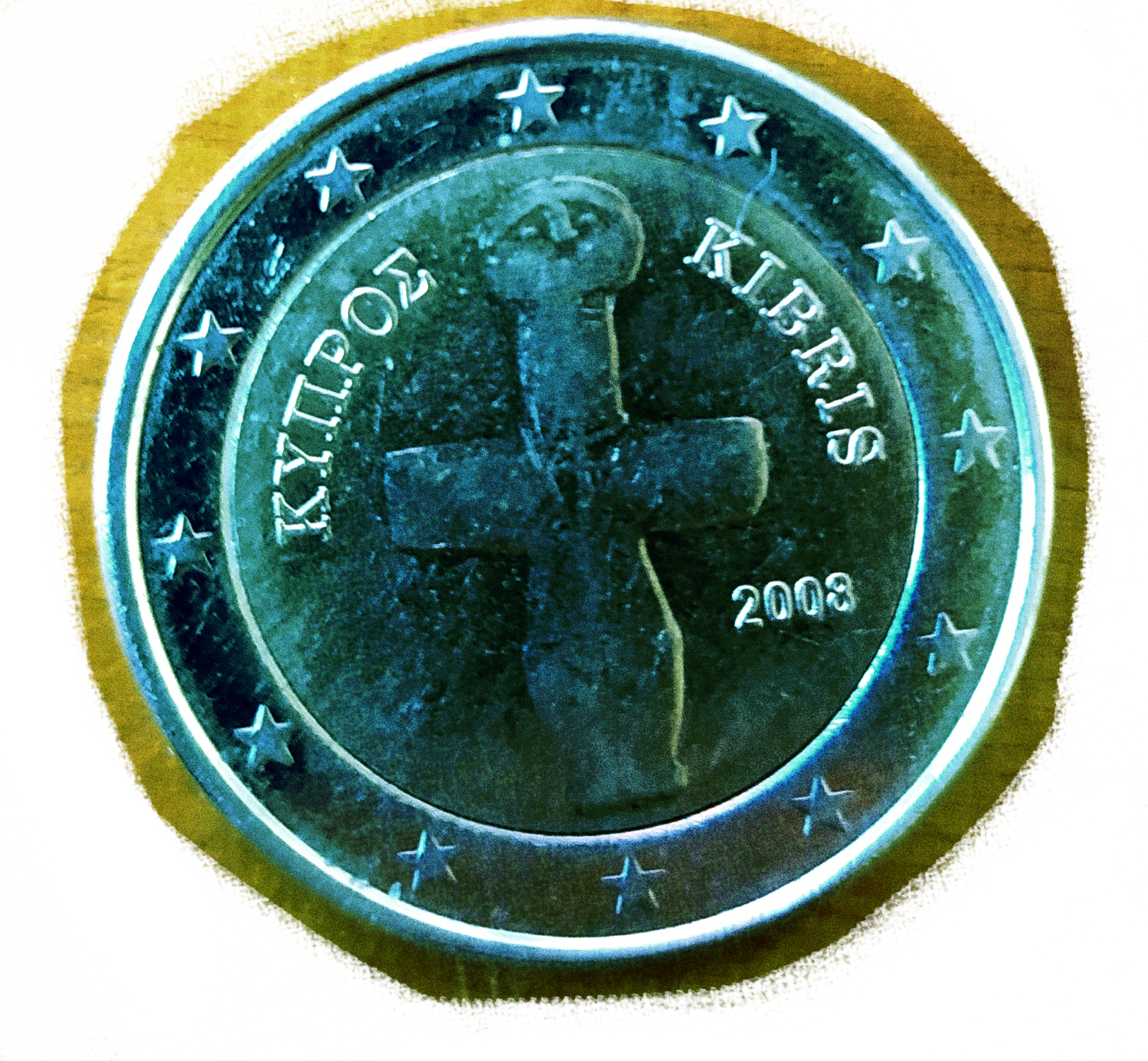 a two euro coin with a cross shaped idol in the middle